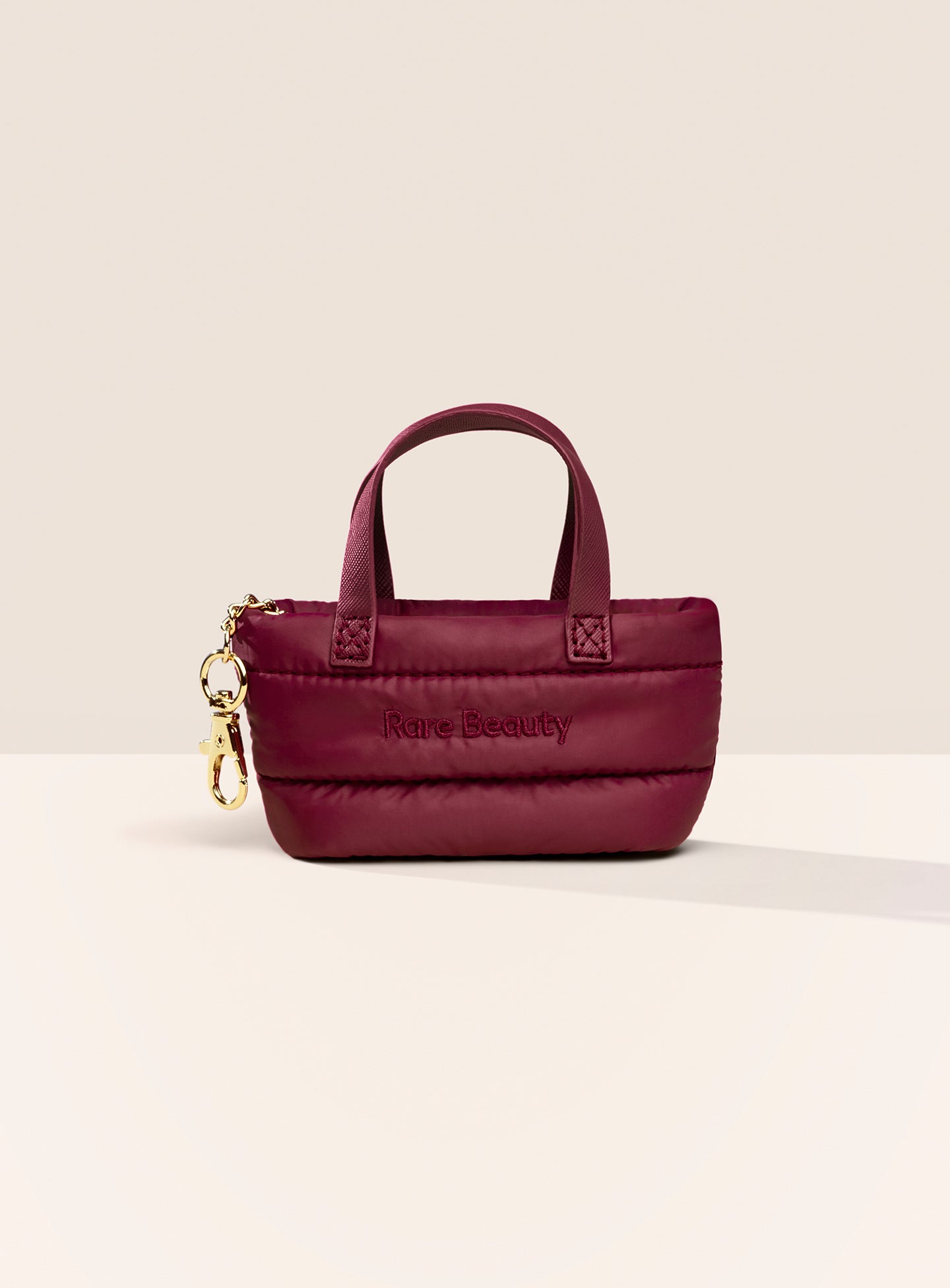ecomm mini puffy keychain merlot.jpg ecomm mini puffy keychain merlot.jpg